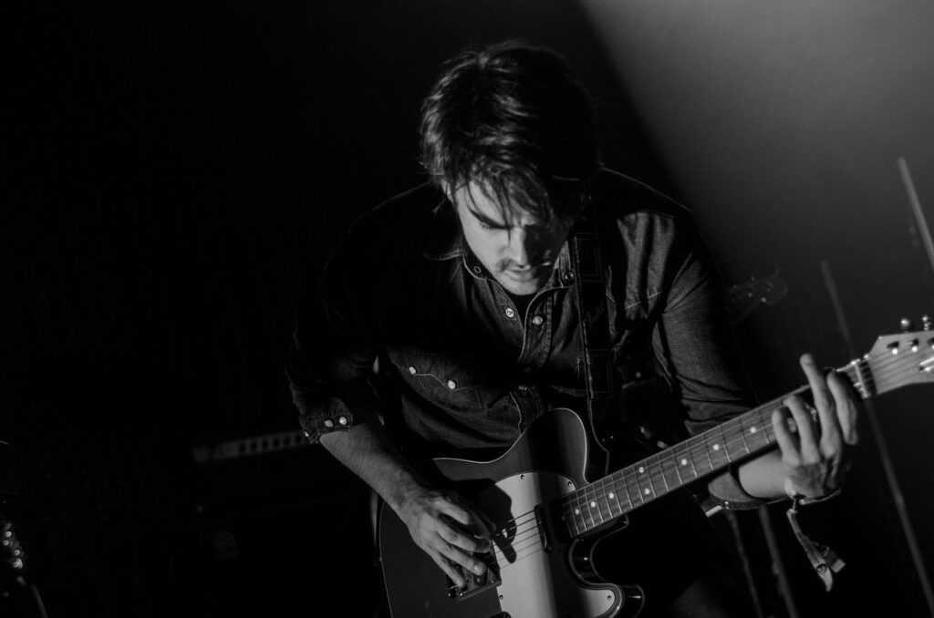 guitar, guitarist, man, music, musical instrument, musician, performance, person, string instrument, black and white, monochrome, guitar, guitar, guitar, guitar, guitar, guitarist, guitarist, music, music, musician, musician