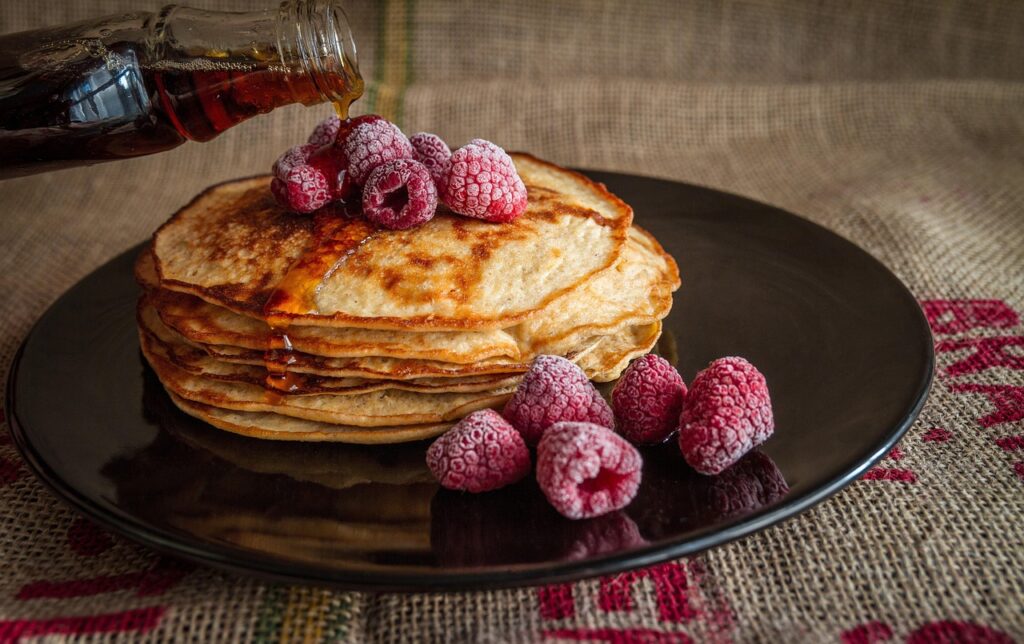 pancakes, maple syrup, raspberries, breakfast, pouring syrup, plate, breakfast plate, stack, stack of pancakes, breakfast food, breakfast meal, sweet, food, delicious, morning, tasty, fruits, food photography, pancakes, breakfast, breakfast, food, food, food, food, food