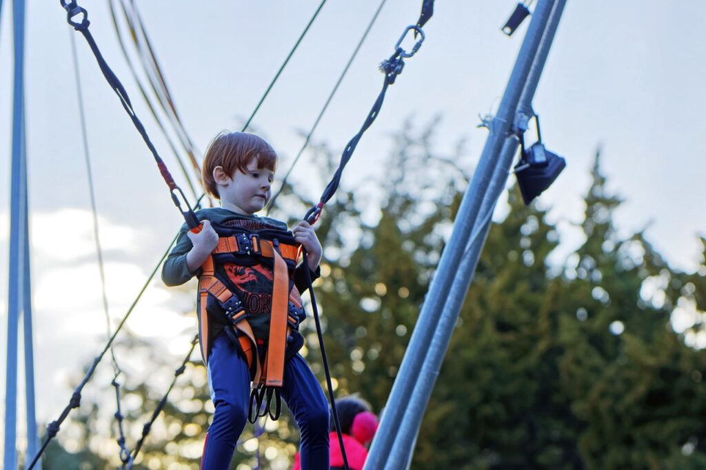 child, little boy, ropes, the elastic, jumping, motion, sports, relaxation, park, fun, heaven