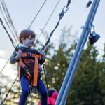 child, little boy, ropes, the elastic, jumping, motion, sports, relaxation, park, fun, heaven